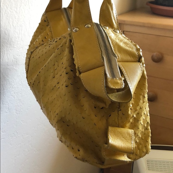 Genuine Leather Soft Yellow Purse holepunch design - Picture 3 of 9